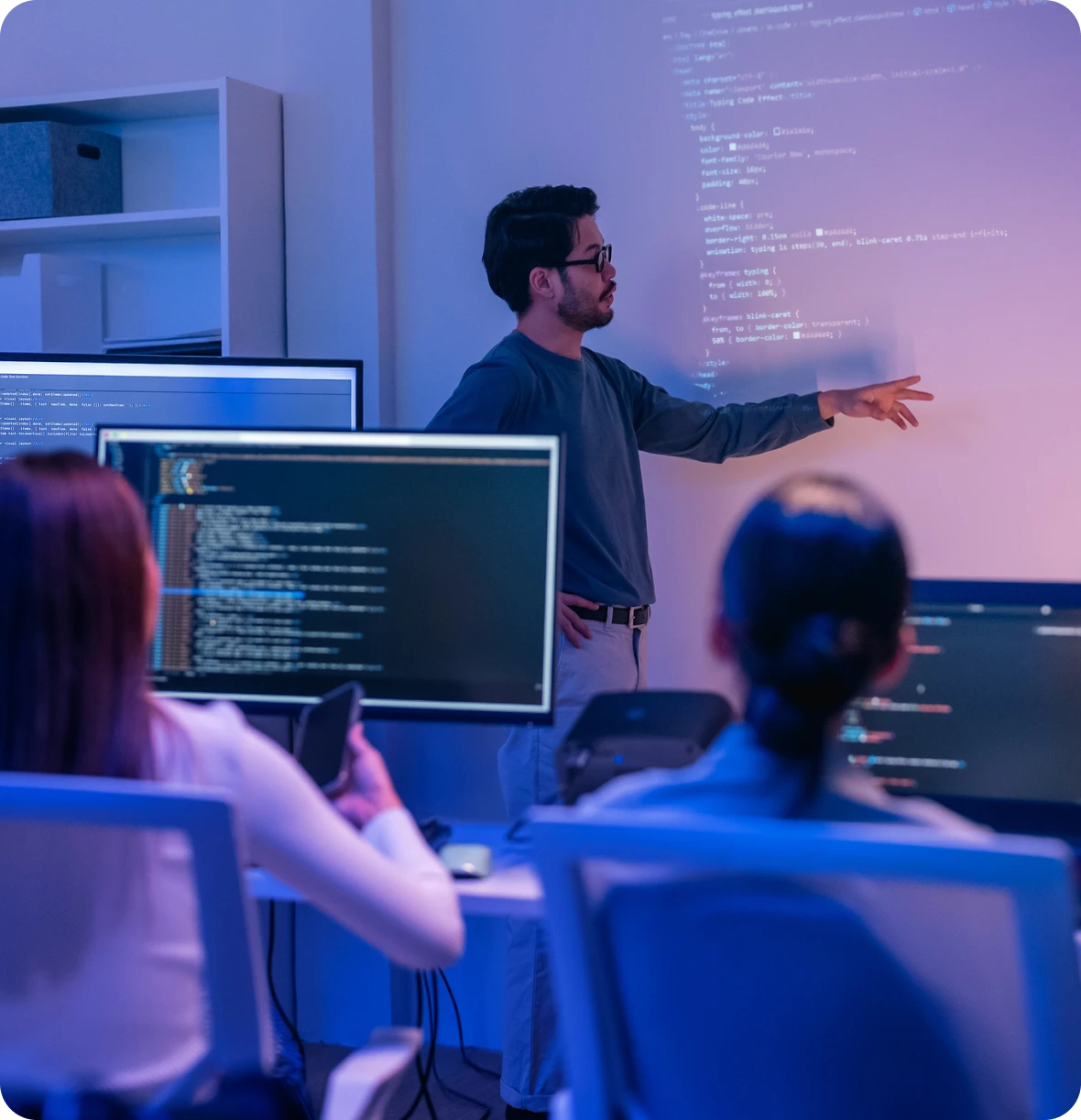 Instructor explaining code on screen